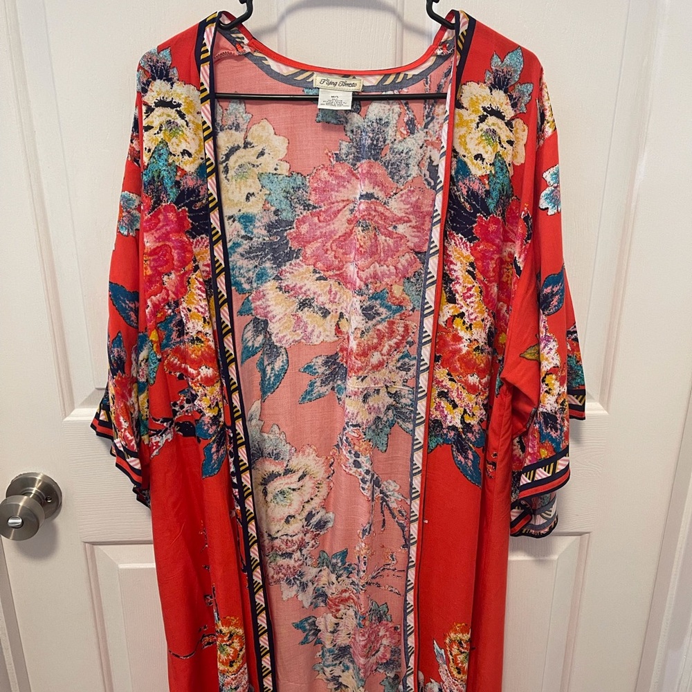 Woman’s kimono about 48 inches long size is a M/L